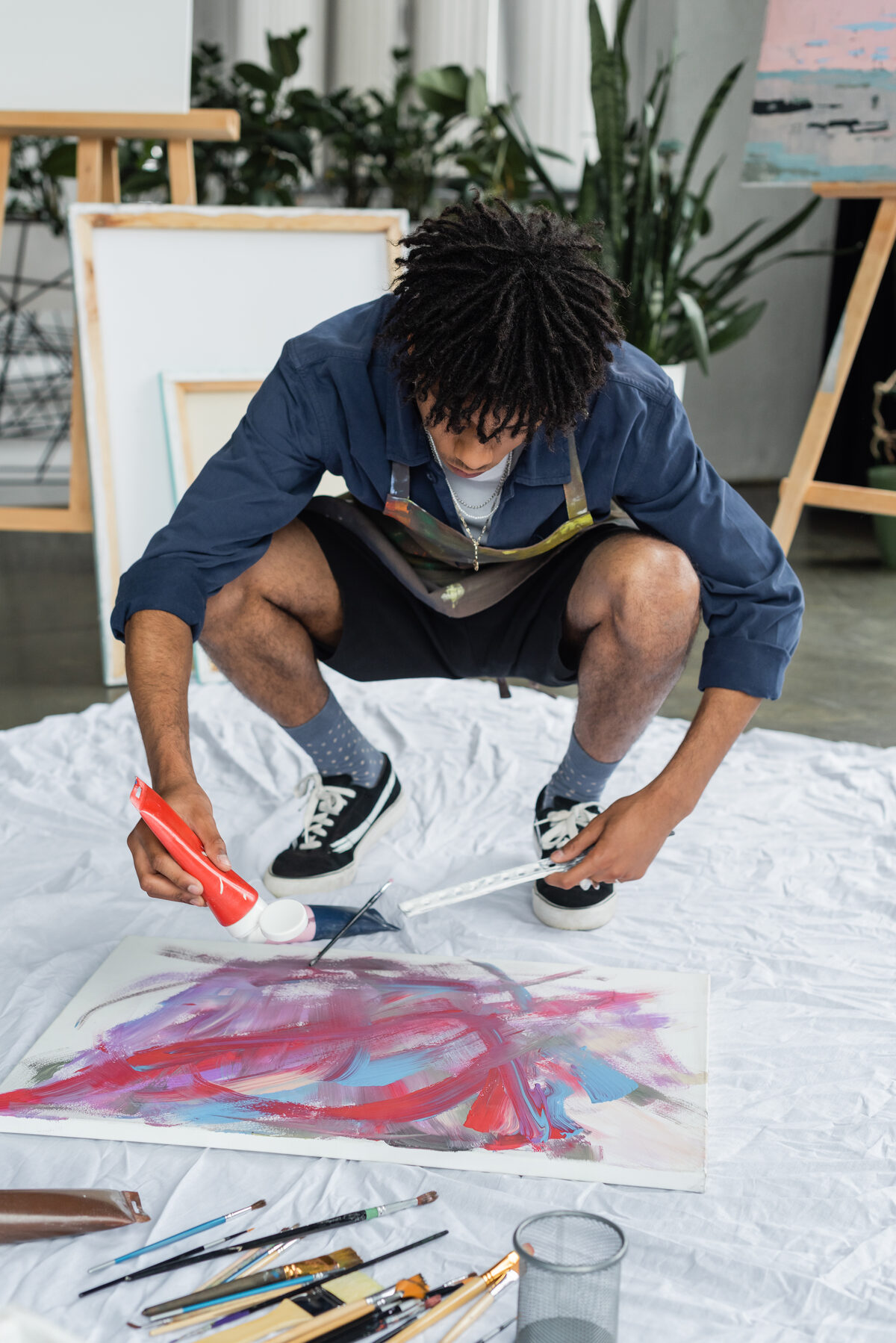 Featured artist Marcus Reid at work in his studio