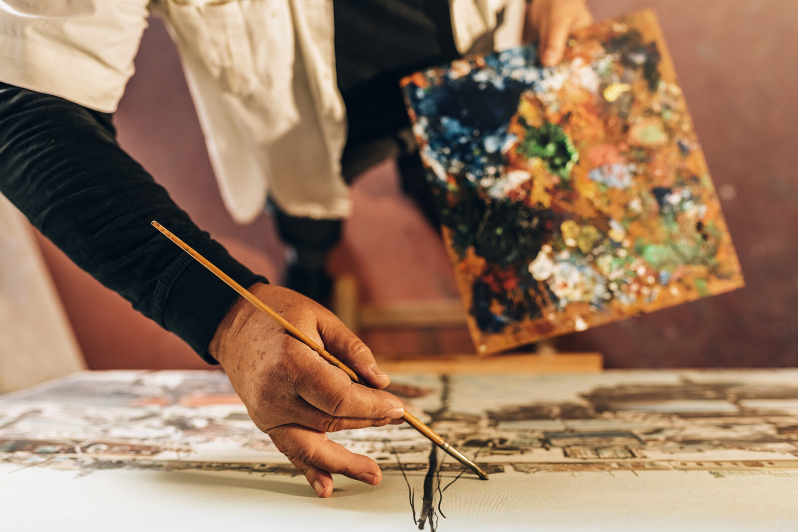 A Memphis-area student working on an acrylic painting